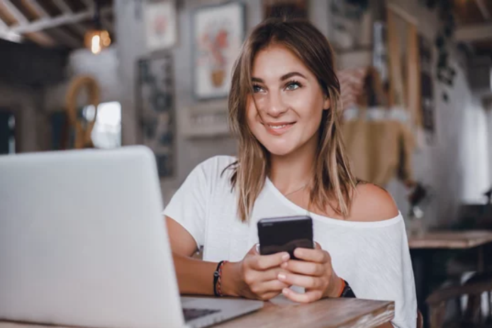 Woman with phone taking a defensive driving course